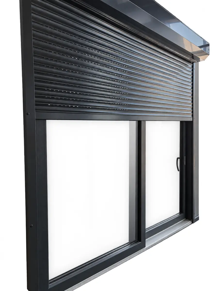 Ventana corredera de aluminio antracita con persiana enrollable, a medida en Terrassa y el Vallès